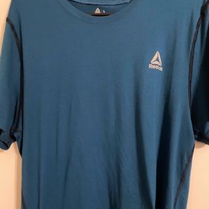 Men’s dk blue soft Reebok shirt size Large great for sports!